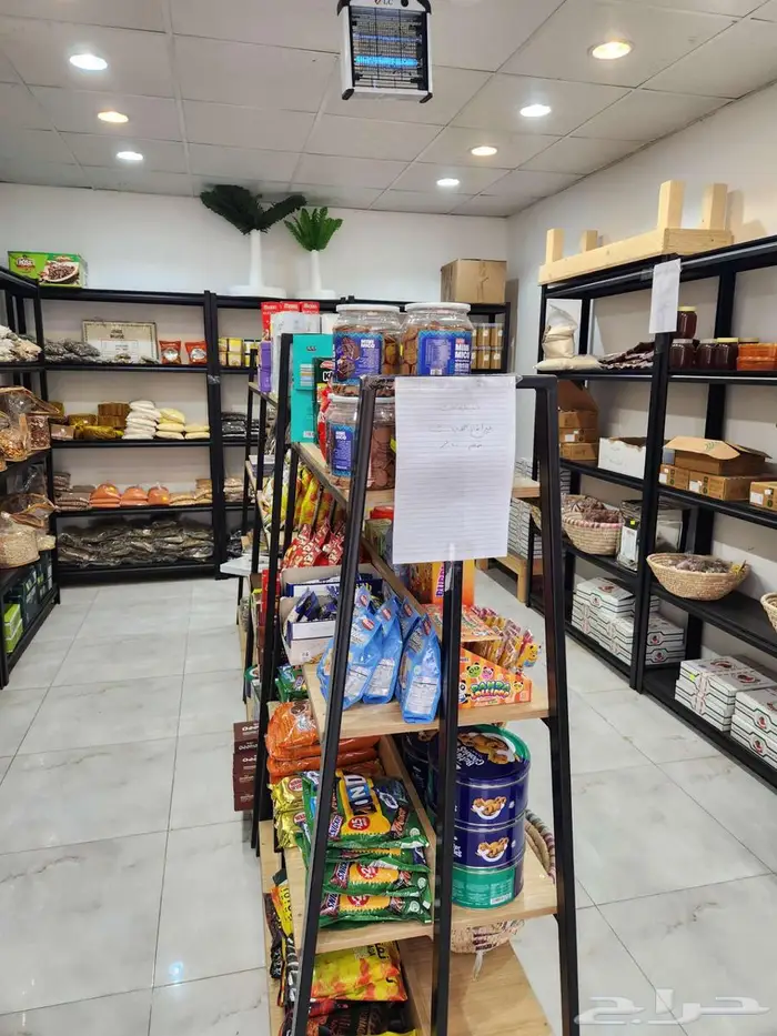 عطارة و مكسرات و تمور للبيع بالكامل 3