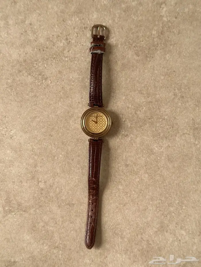 ساعة من Olivia Burton كلاسيكيه بجلد بني و روز قولد 2