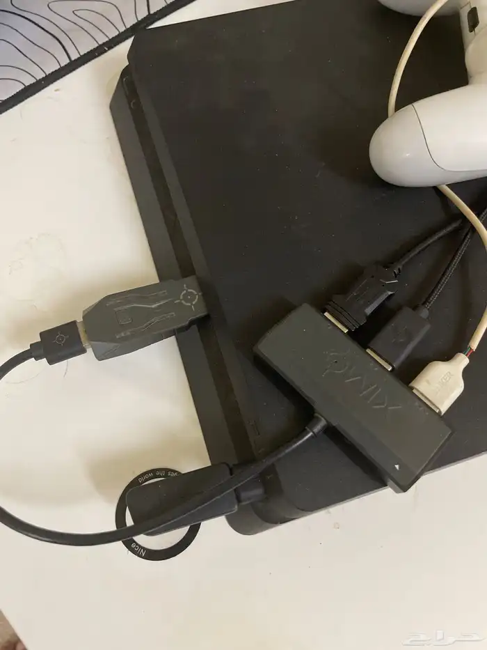 سوني 4 و قطعة xim apex 0