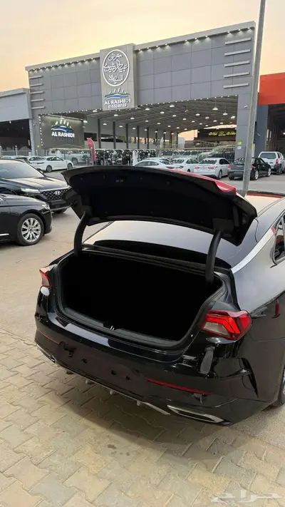 كيا 5 2021 عداد 126000 اسود نص فل 8