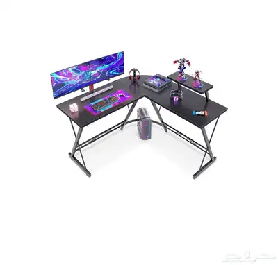 طاولة قيمنق حرف L ( غير مستخدمه ) 0