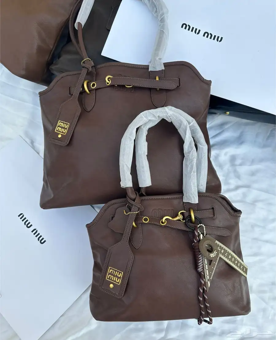شنط ماركة اصلي درجه اولئ شنط جامعه ودوامات 14