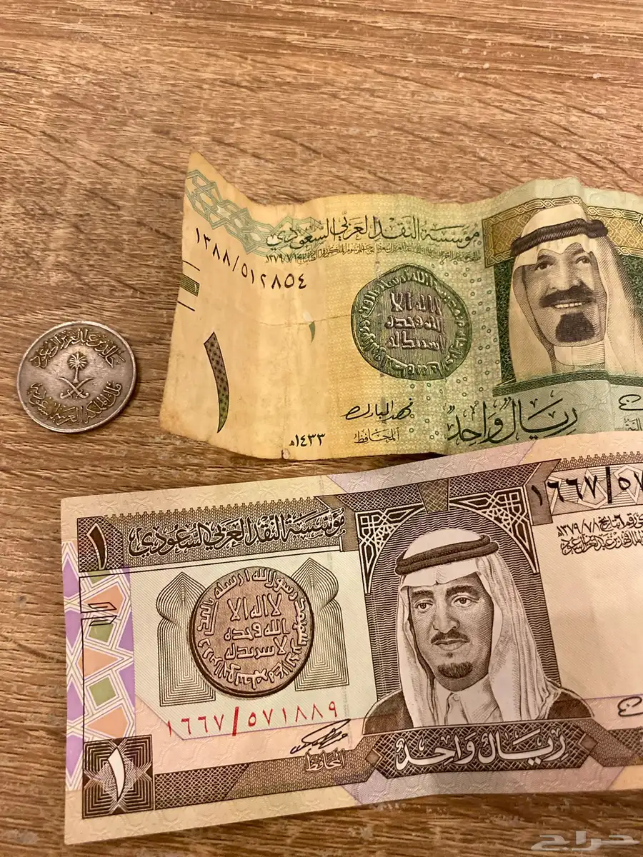 نص من عهد الملك خالد بن عبدالعزيز ال سعود وريال الملك فهد 1