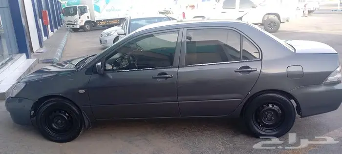 لانسر بومة 2009 3