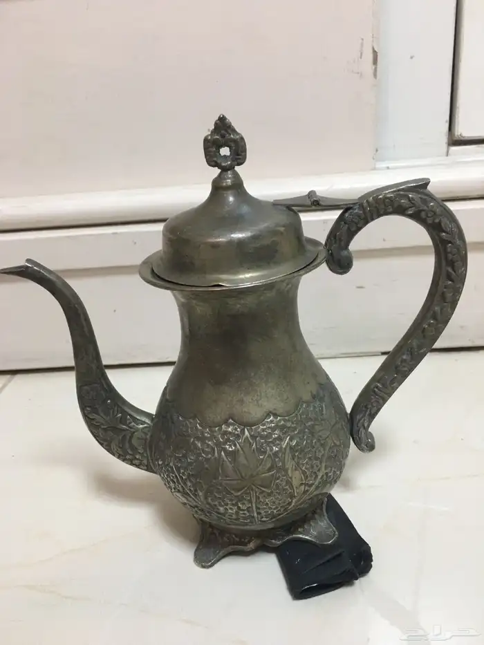 تراث دلة وبراد نحاس 12