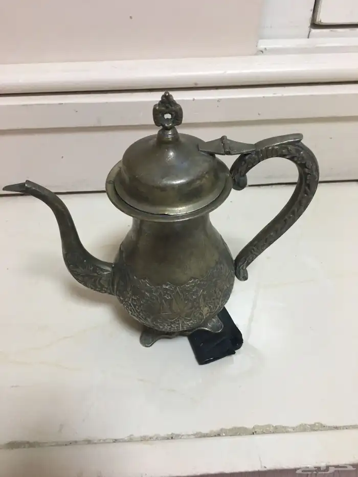 تراث دلة وبراد نحاس 13