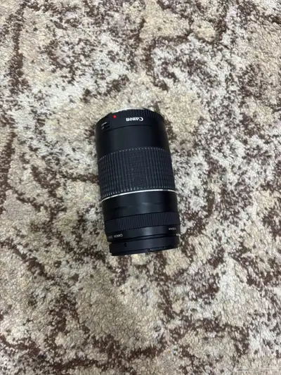 عدسة كانون زوم 0