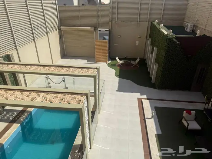 للبيع شاليه مع الاثاث راقي وبجانبه أرض فضاء في حي النفل 7