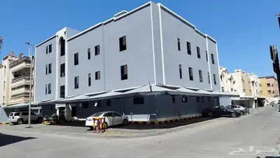 عماره تجاريه على شارعين الدمام حي الزهور موقع مميز 2
