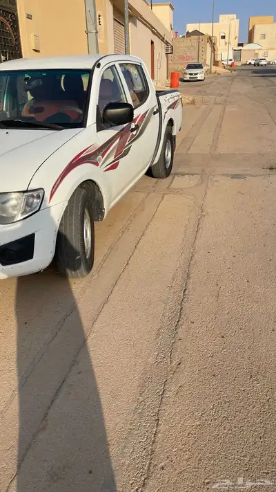 ميتسوبيشي بنزين للبيع L200 9