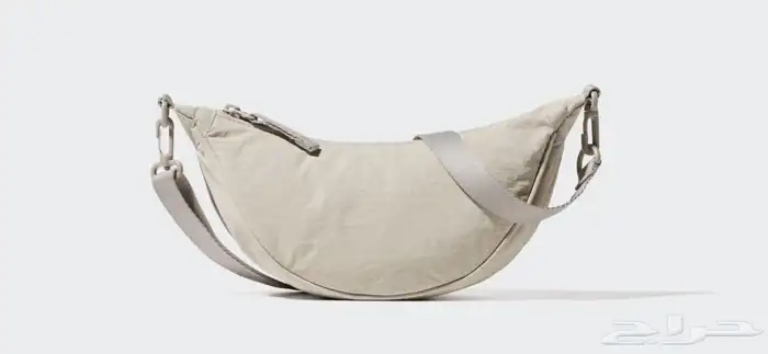 شنطة يد بتصميم عملي وعصري UNIQLO 8