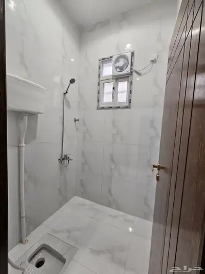 للبيع شقه ارضيه ببايكة سياره تشطيب فندقي ف ابها المحاله 41
