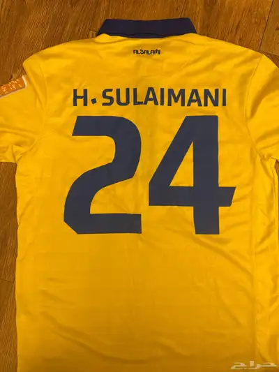 تيشيرت النصر للاعب حسين عبدالغني 2