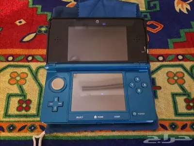 جهاز 3DS الأصلي ازرق مع كامل أغراضه مستعمل للبيع 9