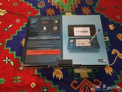 جهاز 3DS الأصلي ازرق مع كامل أغراضه مستعمل للبيع 1