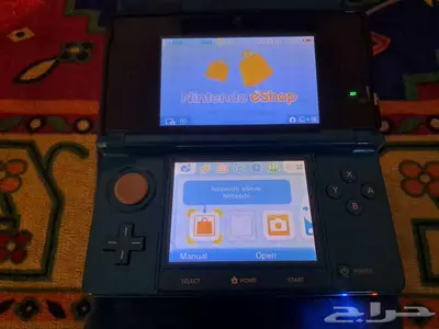 جهاز 3DS الأصلي ازرق مع كامل أغراضه مستعمل للبيع 10