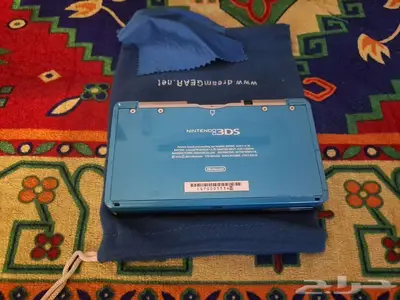 جهاز 3DS الأصلي ازرق مع كامل أغراضه مستعمل للبيع 7