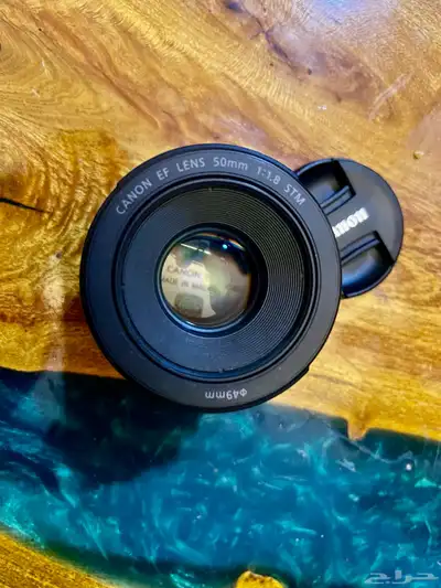 عدسه كانون البورتريه العزل 50mm 1.8 stm canon 4