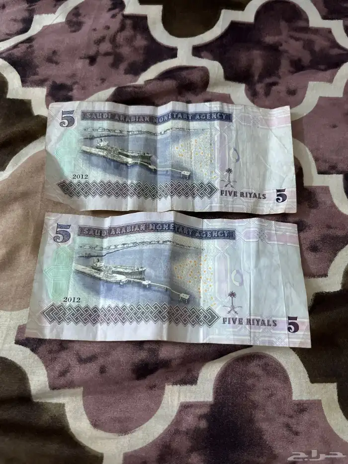 فلوس فيها العشرة والخمسة و ريالات 3
