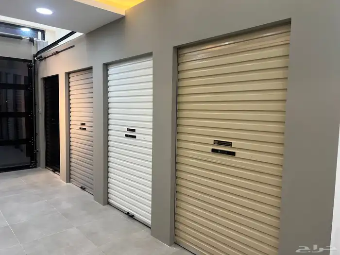 كراجات  صيانة ابواب ابواب اتوماتيكية مواطيرابواب بايكة شتر 1
