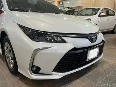 نبيع تويوتا كورولا 2022 سعودي بدي وكاله 1500cc ابيض لؤلؤي 2