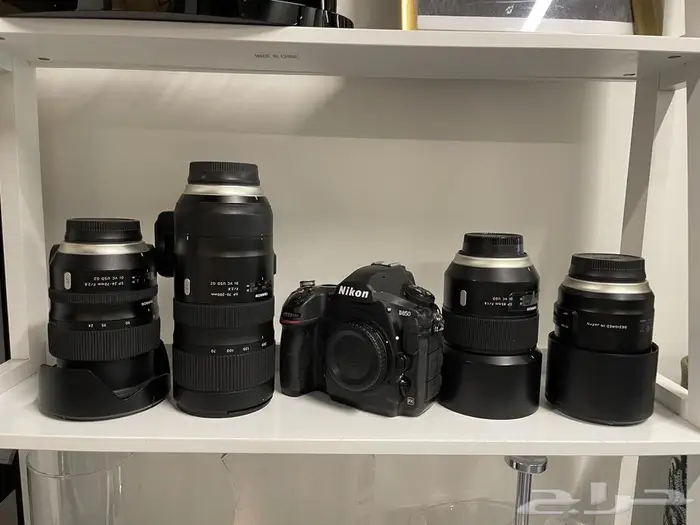 كاميرا Nikon و4 عدسات 7