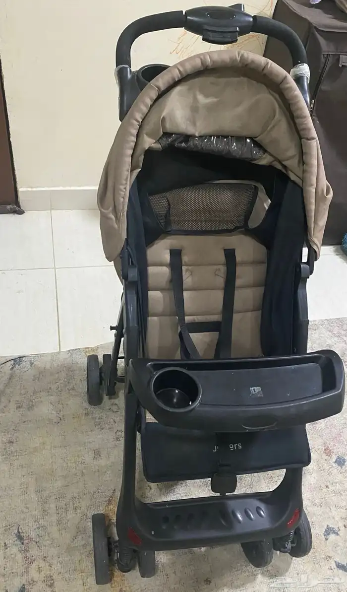 عربة أطفال ماركه جونيور 0
