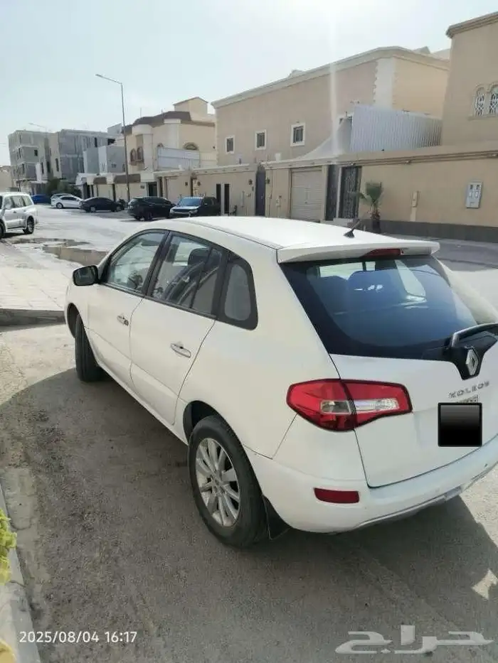 رينو كوليوس ابيض موديل 2014 5