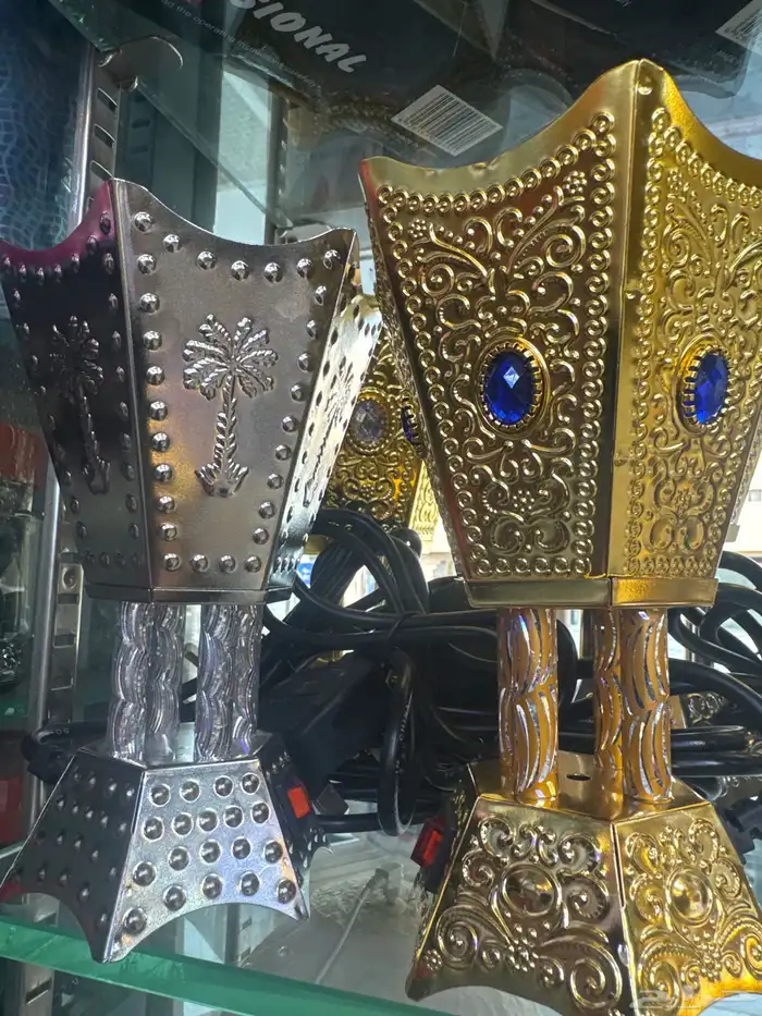 مباخر كهربائلة كبيرة فضي وذهبي عليها شعار النخلة 1