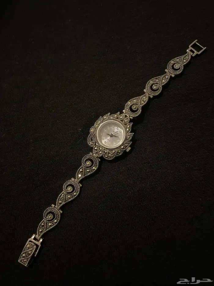 ساعة ( من الفضة ) 0