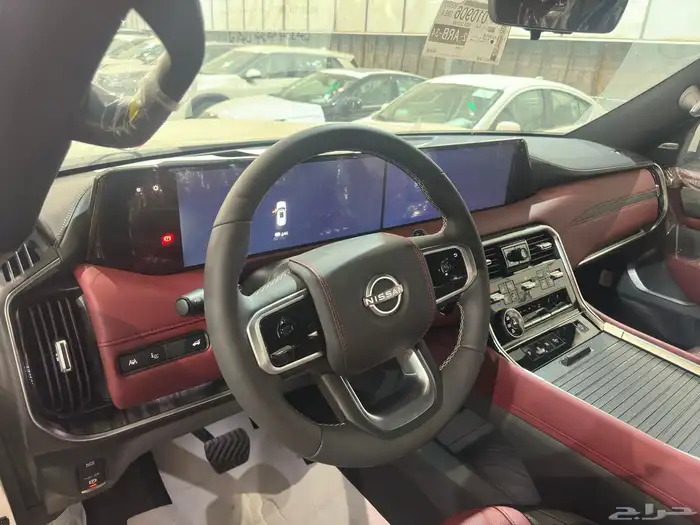 نيسان باترول بلاتينيوم 6 سلندر 2025 ابيض سقف ابيض داخل احمر 12