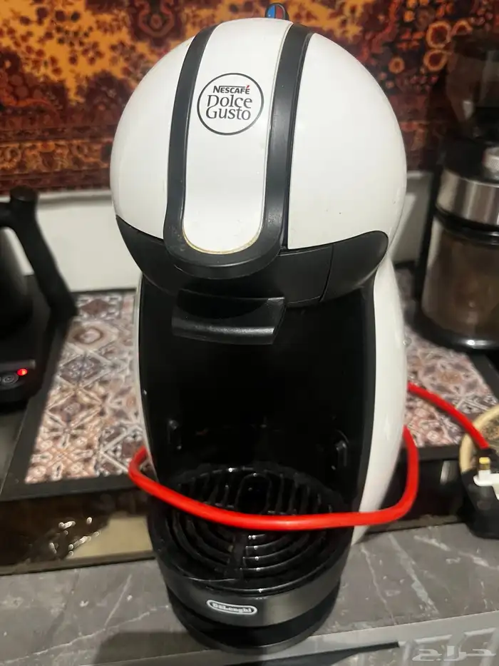 للبيع الالة قهوة تشتغل بالكبسولات وفيه نظام حار وبارد 0