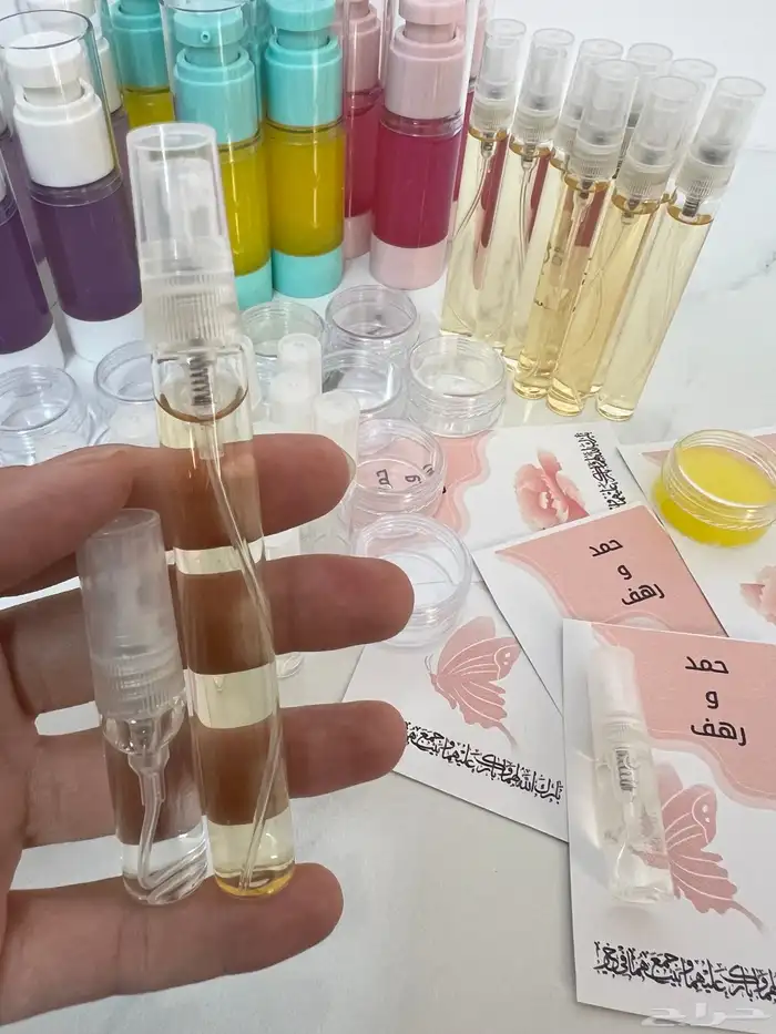 توزيعات عطور مع كرت ثيم طباعه خمريات هدايا 0