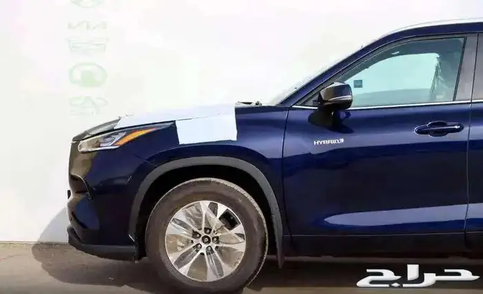 هايلاندر نص ابيض كحلى 2024 3