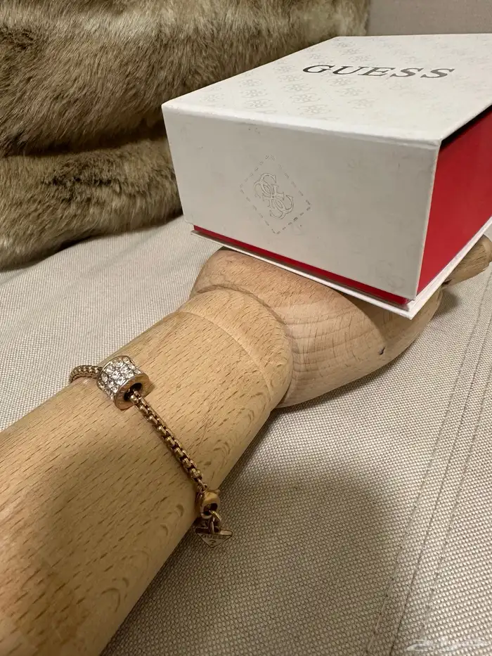 سلسال و أساور جس و فوسيل و ام كي 35