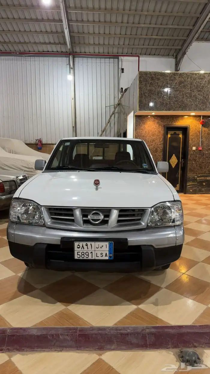 نيسان ددسن 2009 يباني 0