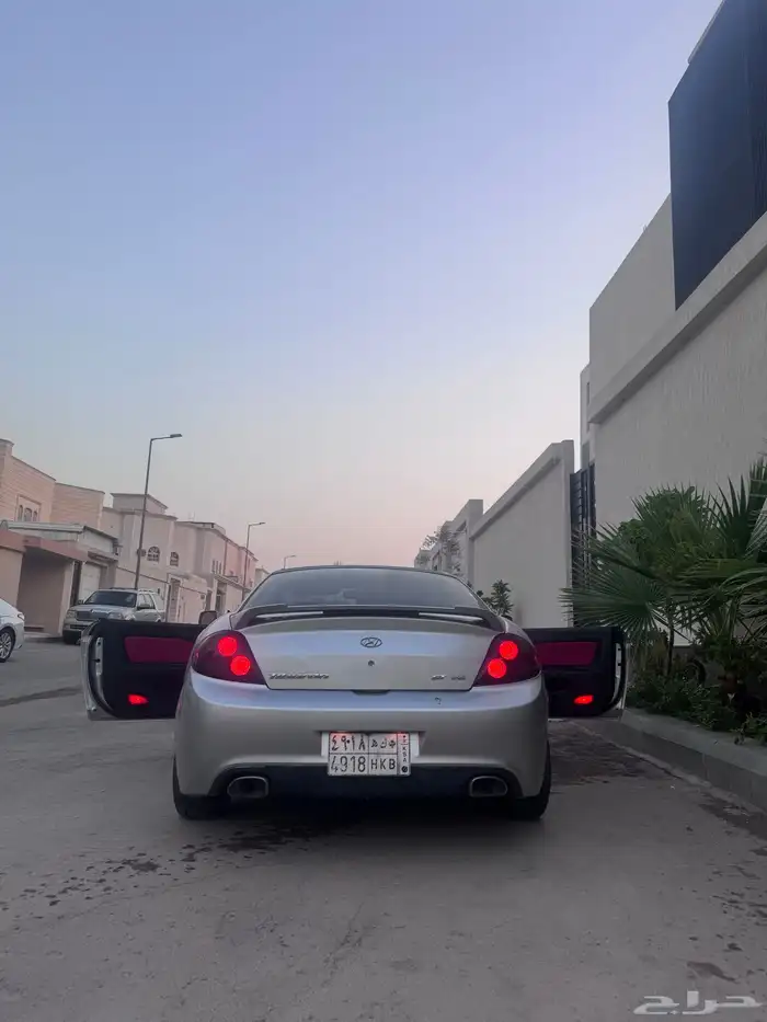 سيارة رياضية مخزنه ممشي 128 باب واحد سبورت مميزة وملفته جدا 3