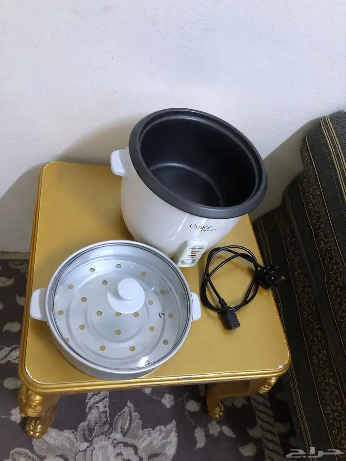 قدر جهاز كهربائي لطبخ الرز و شوايه طعام كهربائيه 1