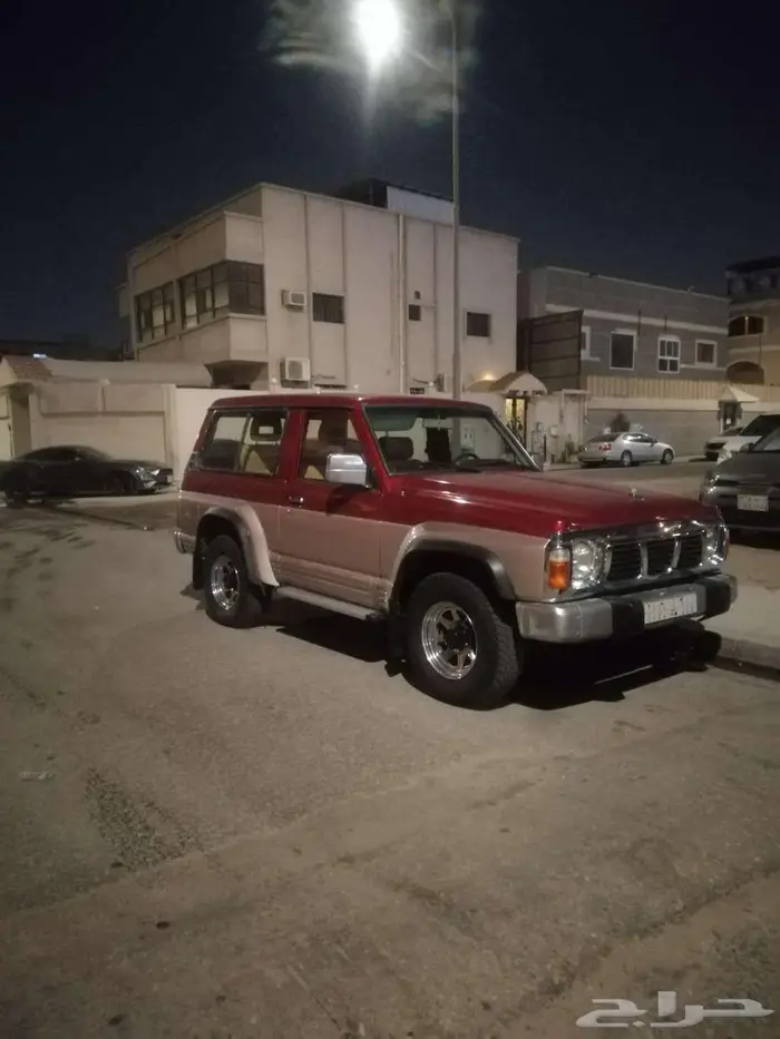 جيب نيسان باترول باب واحد موديل 92 احمر وذهبي 8