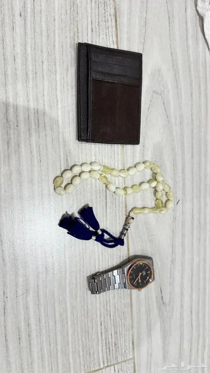 للبيع ساعة ومحفظة وسبحة 2