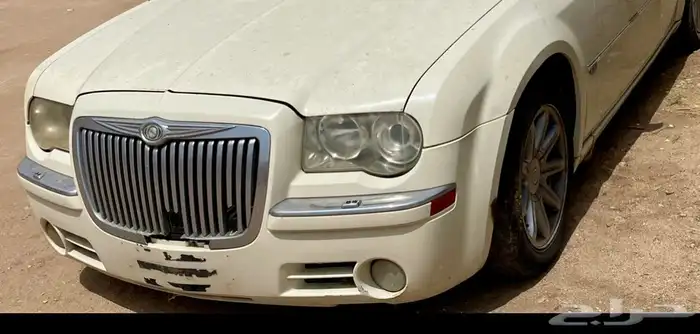 صدام كبوت شمعات قطع كرايسلر 2006 0