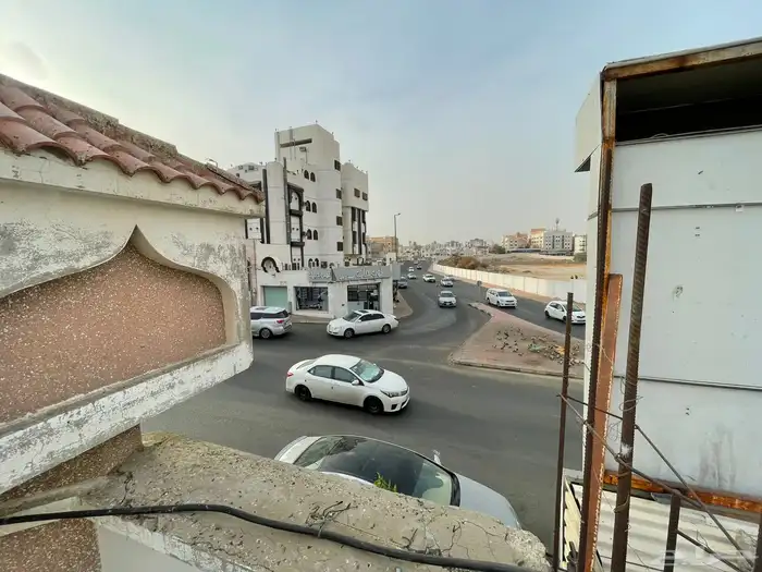 عقار للبيع تجاري استثماري بمساحة 888 مبنيان وخمس محلات 14