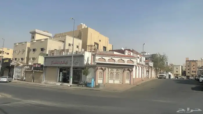 عقار للبيع تجاري استثماري بمساحة 888 مبنيان وخمس محلات 3