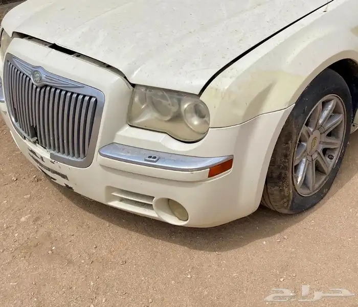 صدام كبوت شمعات قطع كرايسلر 2006 1