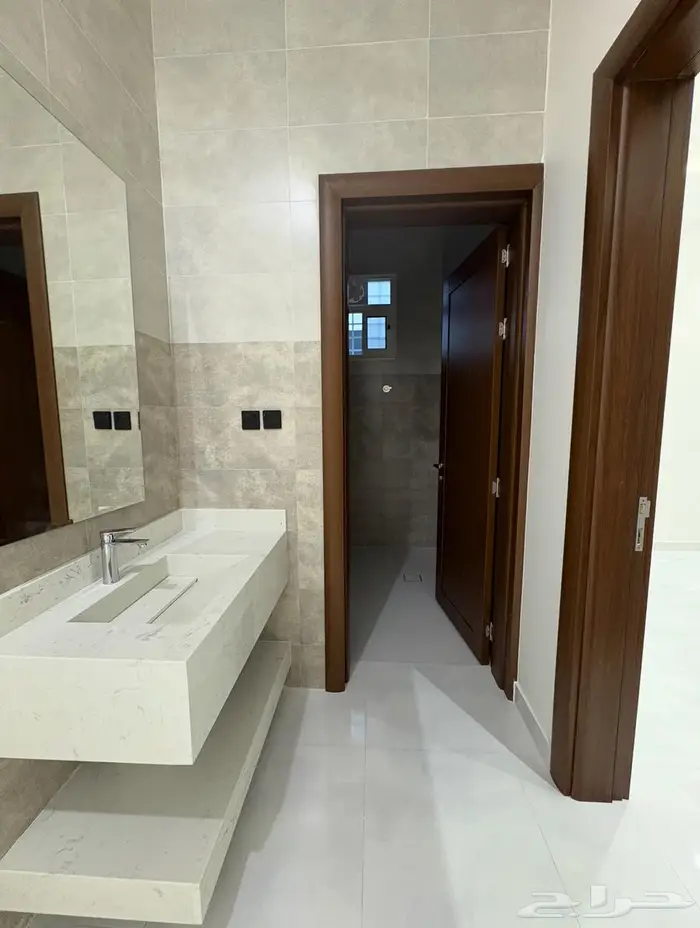 عمارة جديدة فيها شقق جديدة و محلات للايجار - المحالة 2