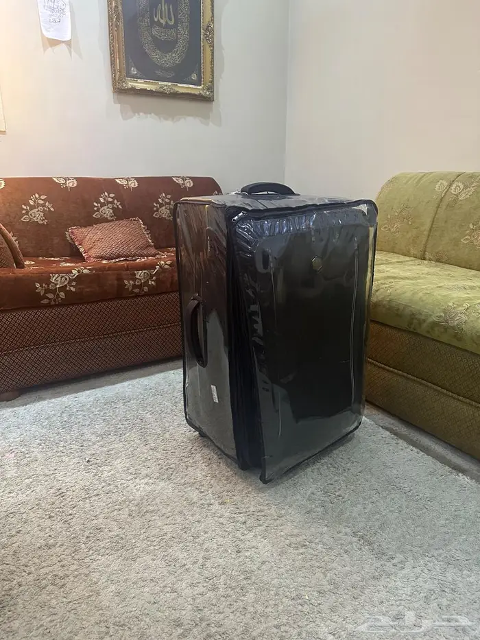 شنطة سفر كبيرة بنية اللون شبة جديدة ماشالله 2