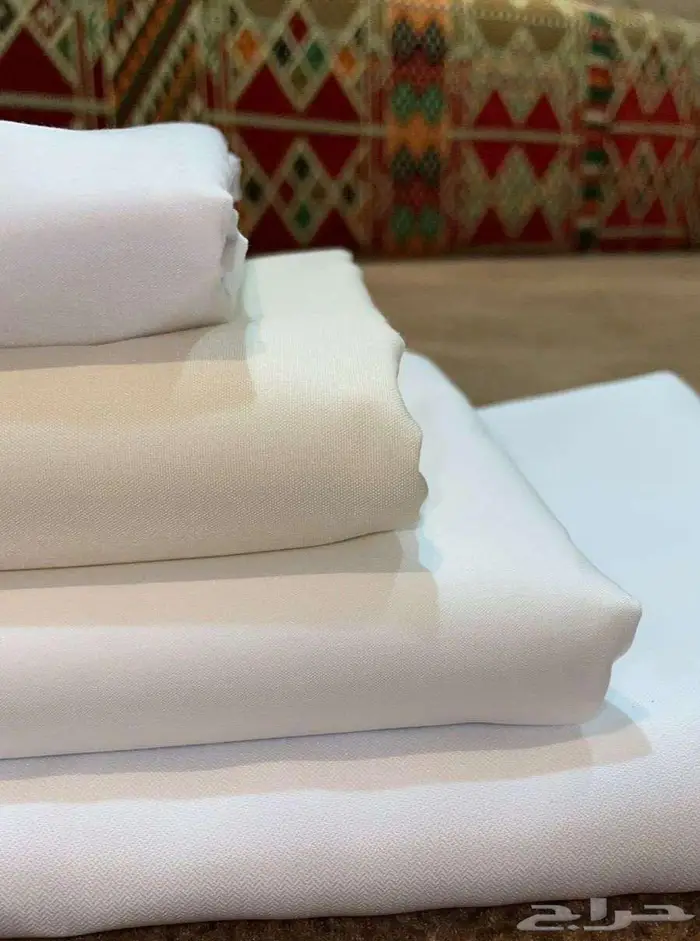 أقمشة ثياب ياباني خامات رسميه وغتر الرويس القطرية 4