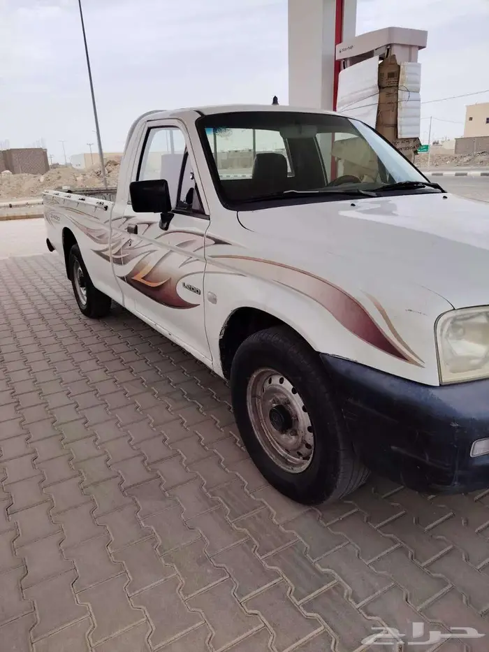 ميتسوبيشي بيك اب ال 200  موديل 2005. 5