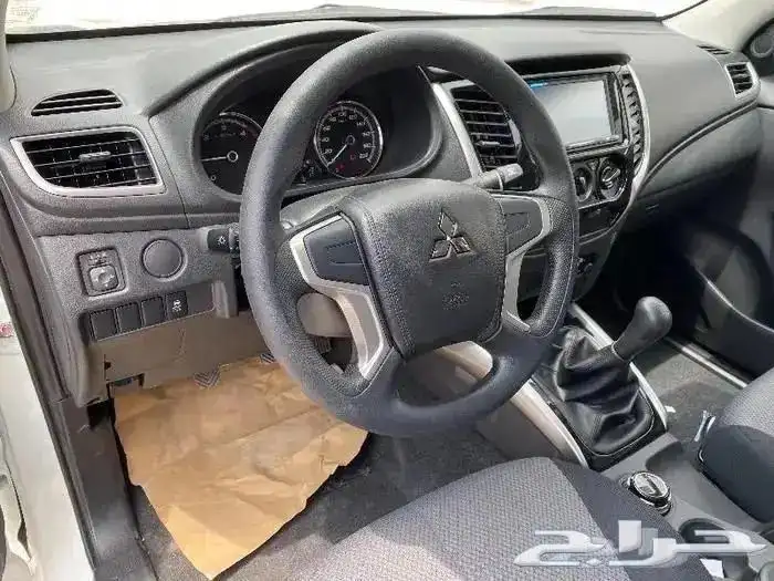 ميتسوبيشي L200 دبل ديزل عادي 2023 6