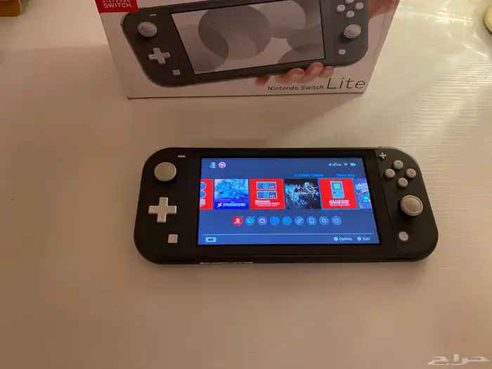 Nintendo Switch Lite نظيف   MicroSD 167GB 9